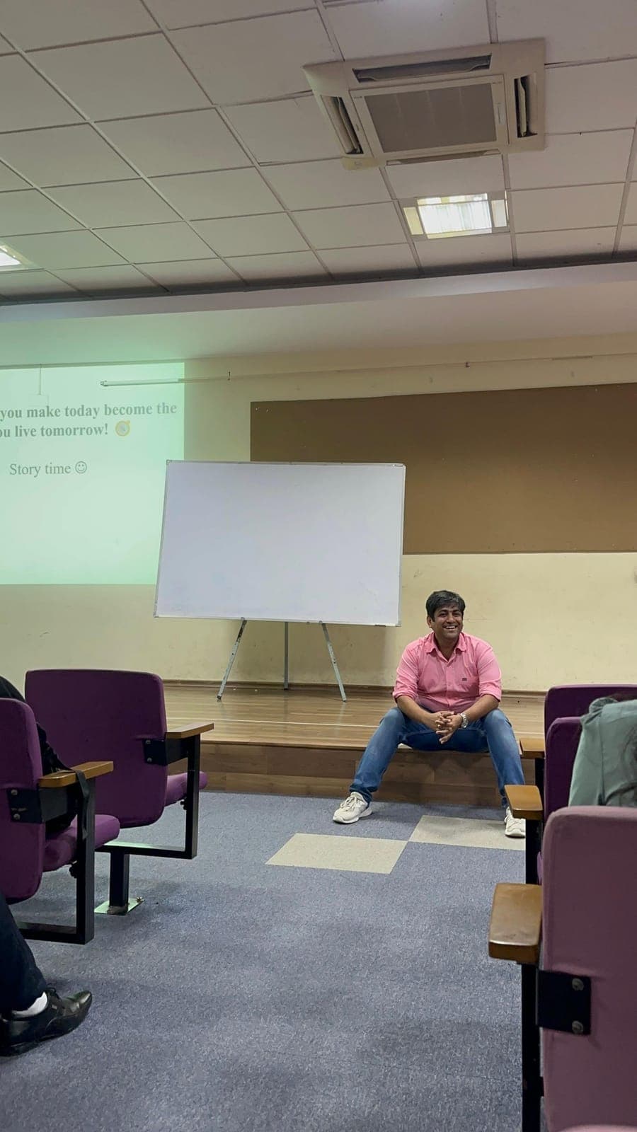 Mohit Garg hosting a storytelling session in a college auditorium
