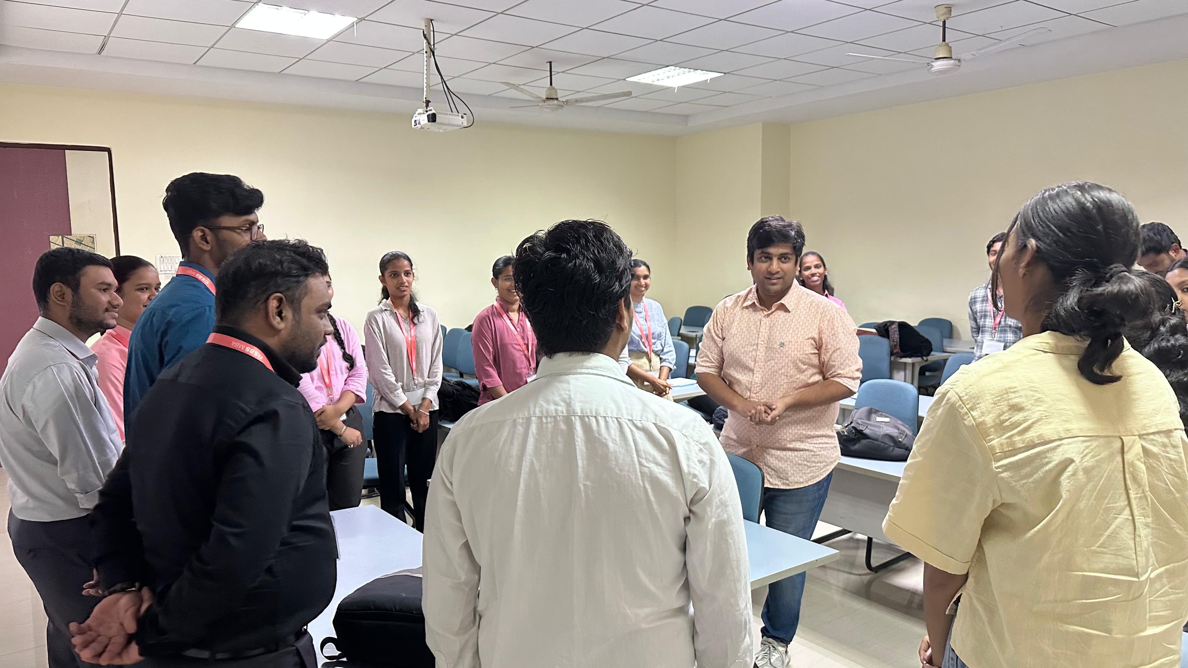 Students standing in a circle during a TGVP session